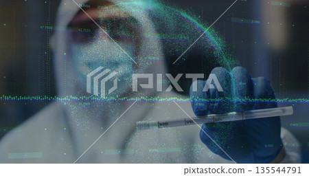 Holding blue-gloved hand gripping specimen tube in lab, streaming holographic waveforms and data 135544791