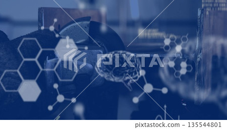 Grinding workpiece with gloved hand operating angle grinder on workbench, showing biotech overlays Grinding workpiece with gloved hand operating angle grinder on workbench, showing biotech overlays 135544801