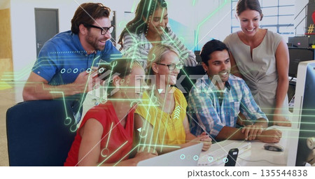 Team of six reviewing content on large monitor in office, in business casual attire Team of six reviewing content on large monitor in office, in business casual attire 135544838
