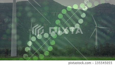 Rising three-blade wind turbine spinning above pasture by hill with stylized DNA overlay Rising three-blade wind turbine spinning above pasture by hill with stylized DNA overlay 135545055