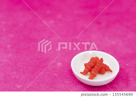 Chinese quince on pink Japanese paper background Chinese quince on pink Japanese paper background 135545699