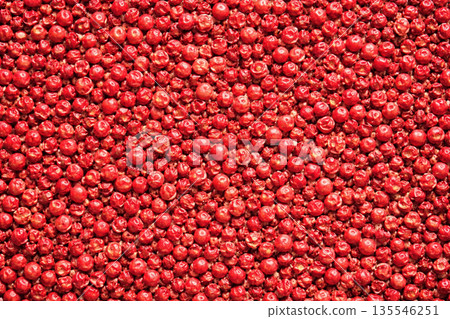Textured background of densely packed pink pepper Textured background of densely packed pink pepper 135546251
