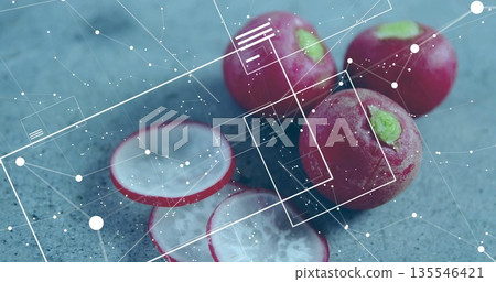 Displaying whole and sliced red radishes lying on gray-blue countertop with white geometric overlay 135546421