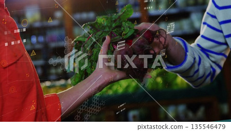 Trading leafy beet bunch between red-shirted employee and striped-sweater customer at produce aisle Trading leafy beet bunch between red-shirted employee and striped-sweater customer at produce aisle 135546479