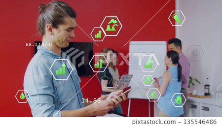 Using handheld device man in denim shirt brainstorming at meeting room with flipchart, copy space Using handheld device man in denim shirt brainstorming at meeting room with flipchart, copy space 135546486