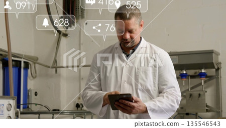 Lab coat technician using tablet in plant, with pipes, cables, notifications, blue filter housings Lab coat technician using tablet in plant, with pipes, cables, notifications, blue filter housings 135546543