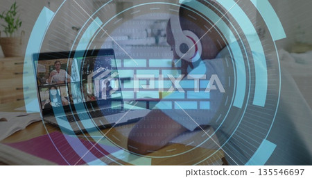 Joining African American teen streaming online class at home desk with laptop headphones overlay 135546697