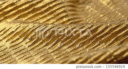 A close-up shot of gold sequin fabric A close-up shot of gold sequin fabric 135546929