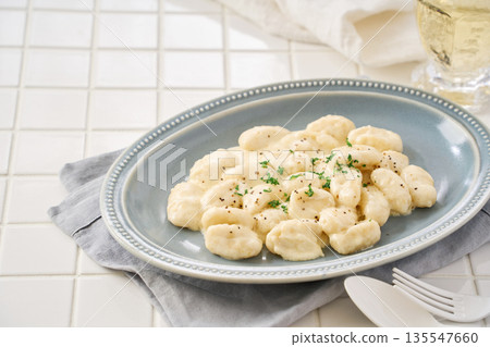 Gnocchi with cheese cream sauce Gnocchi with cheese cream sauce 135547660