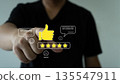 Customer Feedback and Satisfaction Rating Concept with Five Star Review and Thumbs Up 135547911