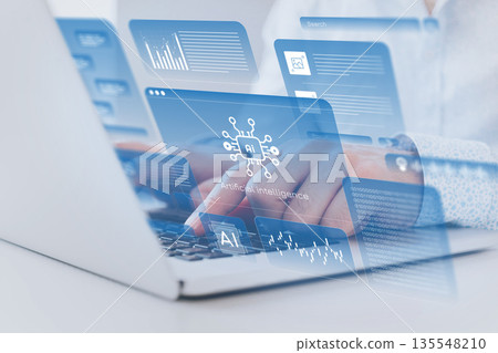 Exploring artificial intelligence with a laptop in a modern workspace during daytime Exploring artificial intelligence with a laptop in a modern workspace during daytime 135548210