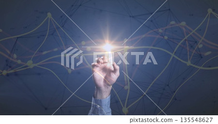 Touching hand in blue shirt reaching toward glowing node in virtual interface, with network overlay Touching hand in blue shirt reaching toward glowing node in virtual interface, with network overlay 135548627