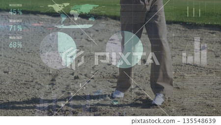 Standing male wearing grey jacket brown pants on sandy edge, with semi-transparent data overlays Standing male wearing grey jacket brown pants on sandy edge, with semi-transparent data overlays 135548639