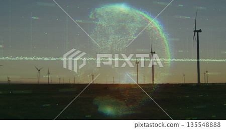 Displaying digital globe hologram hovering over wind turbines at dusk, with data points, code lines 135548888