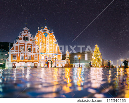 Riga, Latvia. Town Hall Square, Popular Place With Famous Landmarks On It In Night Illumination In Winter Twilight. Winter New Year Christmas Holiday Season Riga, Latvia. Town Hall Square, Popular Place With Famous Landmarks On It In Night Illumination In Winter Twilight. Winter New Year Christmas Holiday Season 135549263