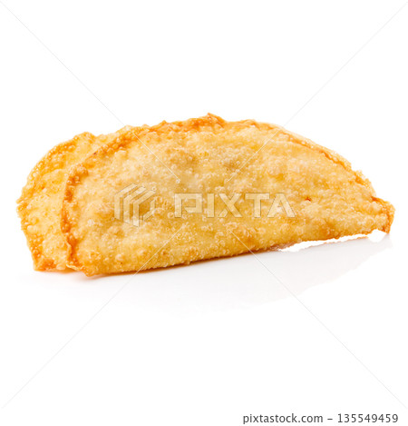 Crispy fried Cig borek served on a white background in a simple setting Crispy fried Cig borek served on a white background in a simple setting 135549459