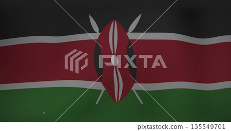 Displaying Kenyan national flag rippling in dark studio, with Maasai shield and crossed spears 135549701