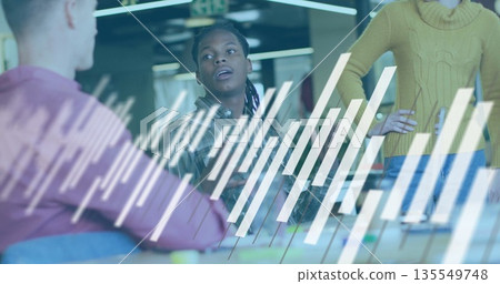 Gesturing Black male coworker explaining ideas at conference table, with sticky notes and markers 135549748