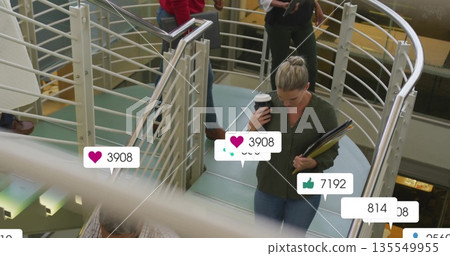 Walking woman holding coffee, folders on mezzanine, with floating social media icons, copy space 135549955