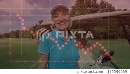 Smiling mature female golfer holding club on lush fairway, with golf cart, translucent grid overlay 135549969