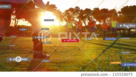 Taking shot seven women soccer players practicing on sunset field, with net, ball and UI overlays Taking shot seven women soccer players practicing on sunset field, with net, ball and UI overlays 135550075