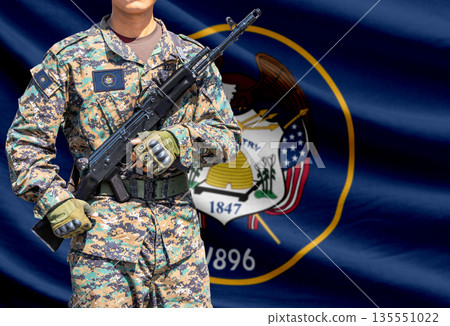 Utah US state flag with soldier holding assault rifle Utah US state flag with soldier holding assault rifle 135551022