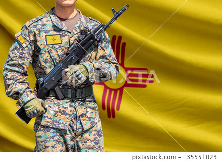 New Mexico US state flag with soldier holding assault rifle 135551023