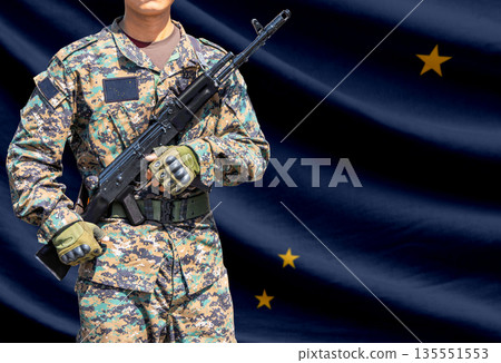 Alaska US state flag with soldier holding assault rifle 135551553