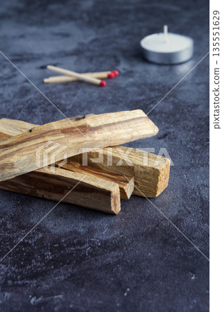 Palo santo wood on a dark background 135551629