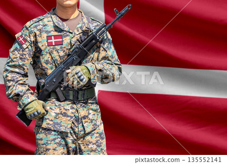 Denmark flag with soldier holding assault rifle 135552141