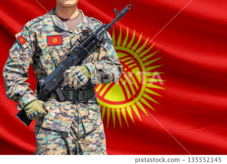 Kyrgyzstan flag with soldier holding assault rifle Kyrgyzstan flag with soldier holding assault rifle 135552145