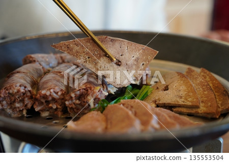 Assorted Korean traditional Sundae (blood sausage), a popular authentic street food platter 135553504