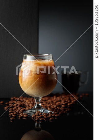 Cream and coffee cocktail with ice. Cream and coffee cocktail with ice. 135553850