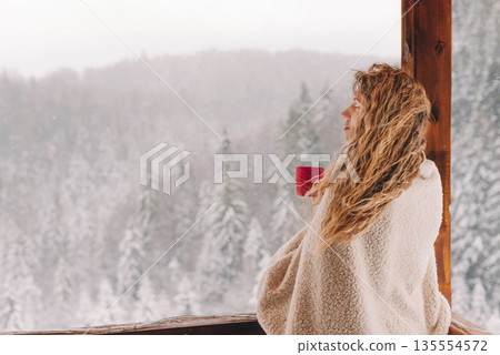 Blonde Woman in Cozy Plaid with Hot Drink 135554572