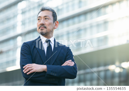 Middle-aged businessman Middle-aged businessman 135554635