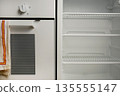 Clean Fridge and Oven in Modern Kitchen 135555147