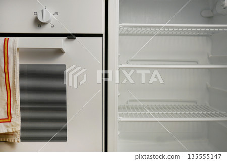 Clean Fridge and Oven in Modern Kitchen Clean Fridge and Oven in Modern Kitchen 135555147