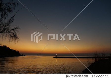 golden dawn on the sea. 135555443