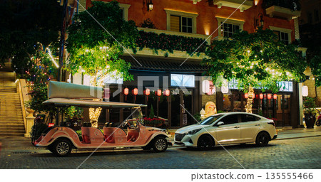 Night view of hotel facades and busy plaza, Phu Quoc Vietnam 135555466