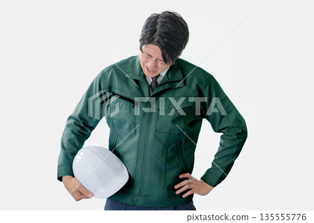 Exhausted male worker Exhausted male worker 135555776