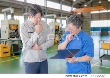 Worried workers Worried workers 135555862