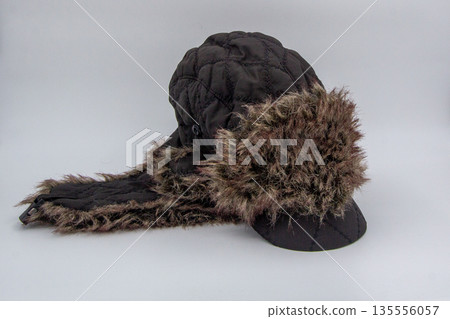 Warm winter cap with fur and long ear warmers Warm winter cap with fur and long ear warmers 135556057