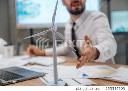 Man is working in the wind turbine company 135556303