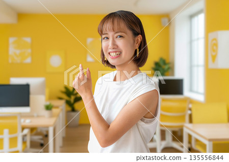 Yellow office and smiling woman Yellow office and smiling woman 135556844