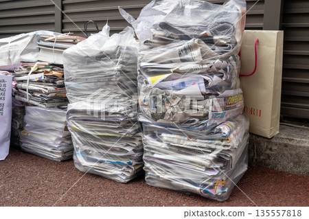 Recyclable waste such as used paper and newspapers 135557818