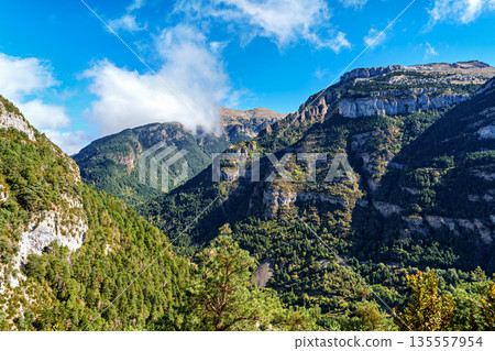 Hiking the Majada de Gabardito trail at Canfranc in Huesca, Spain. Close to the border with France. Hiking the Majada de Gabardito trail at Canfranc in Huesca, Spain. Close to the border with France. 135557954