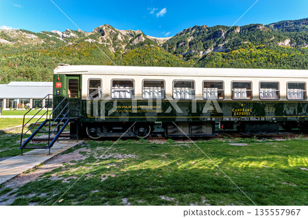 Old wagons in the old train station of Canfranc in the Pyrenees in Huesca, Spain close to the border with France. Old wagons in the old train station of Canfranc in the Pyrenees in Huesca, Spain close to the border with France. 135557967