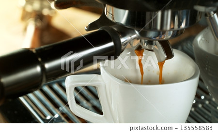 Espresso Extraction on a Lever Coffee Machine , Macro Shot 135558583