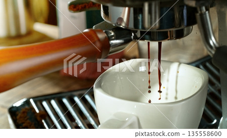 Espresso Extraction on a Lever Coffee Machine , Macro Shot 135558600