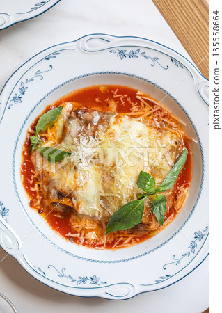 Classic lasagna with tomato sauce and cheese Classic lasagna with tomato sauce and cheese 135558664